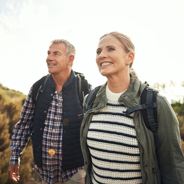 middle aged couple on hike