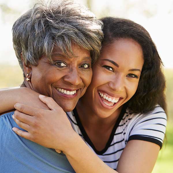 Mother and Daughter hugging each other